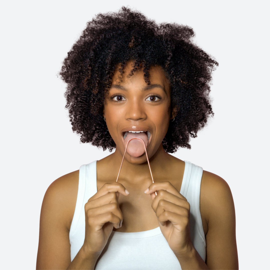 how to clean your tongue with a tongue scraper